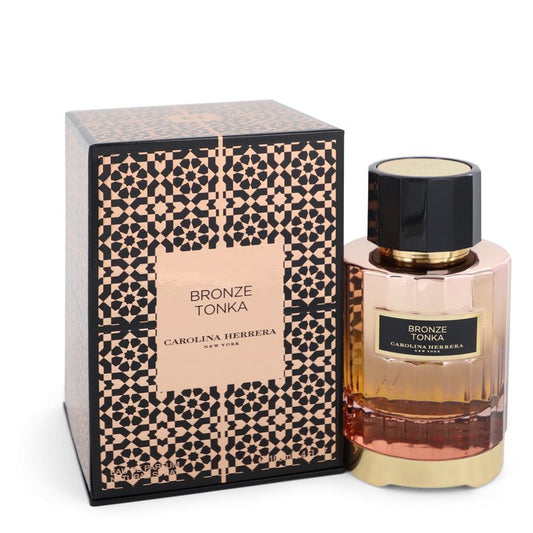 Bronze Tonka Eau De Parfum Spray 3.4 oz Eau De Parfum Spray (Unisex) For Men By Carolina Herrera